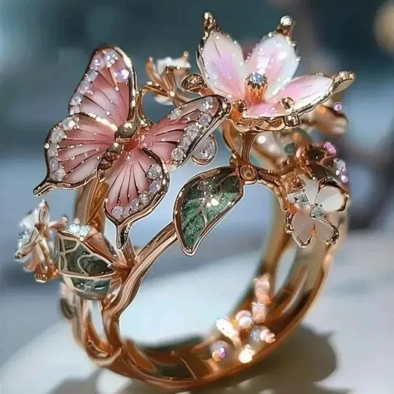 close up of the pink butterfly wings on the scarf ring