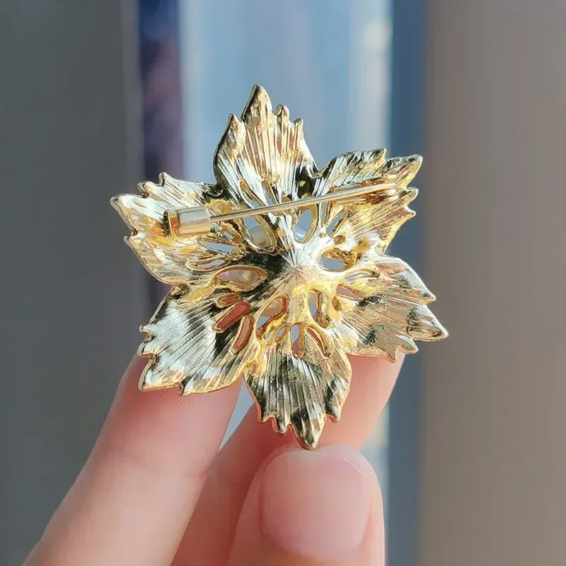 pin and catch on the back of the flower brooch