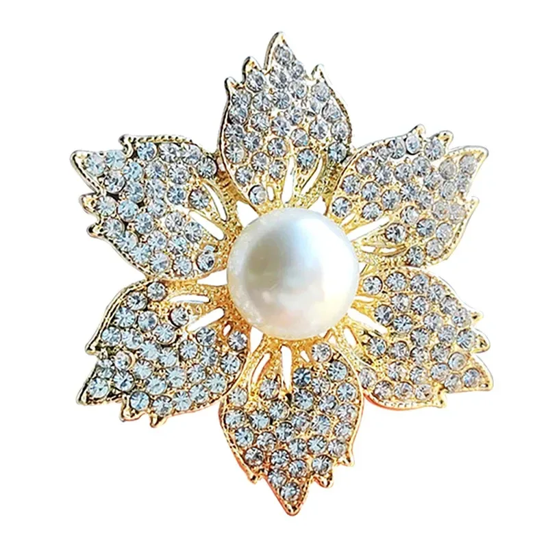 six rhinestone petals of the gold-tone flower brooch