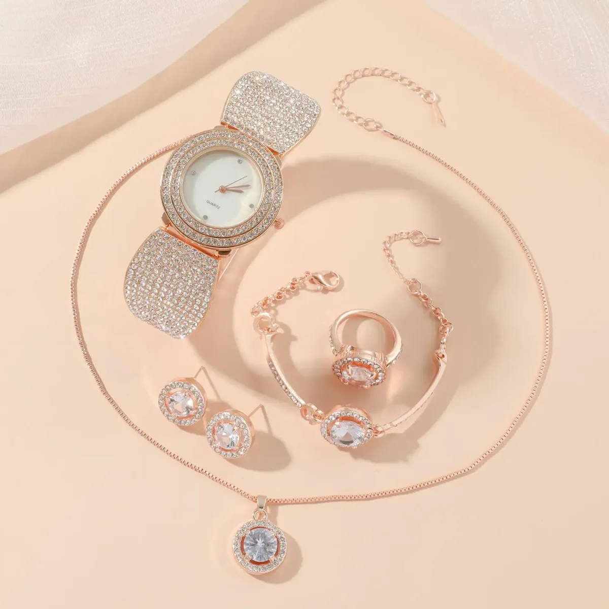 all five pieces of the rhinestone watch and jewelry set