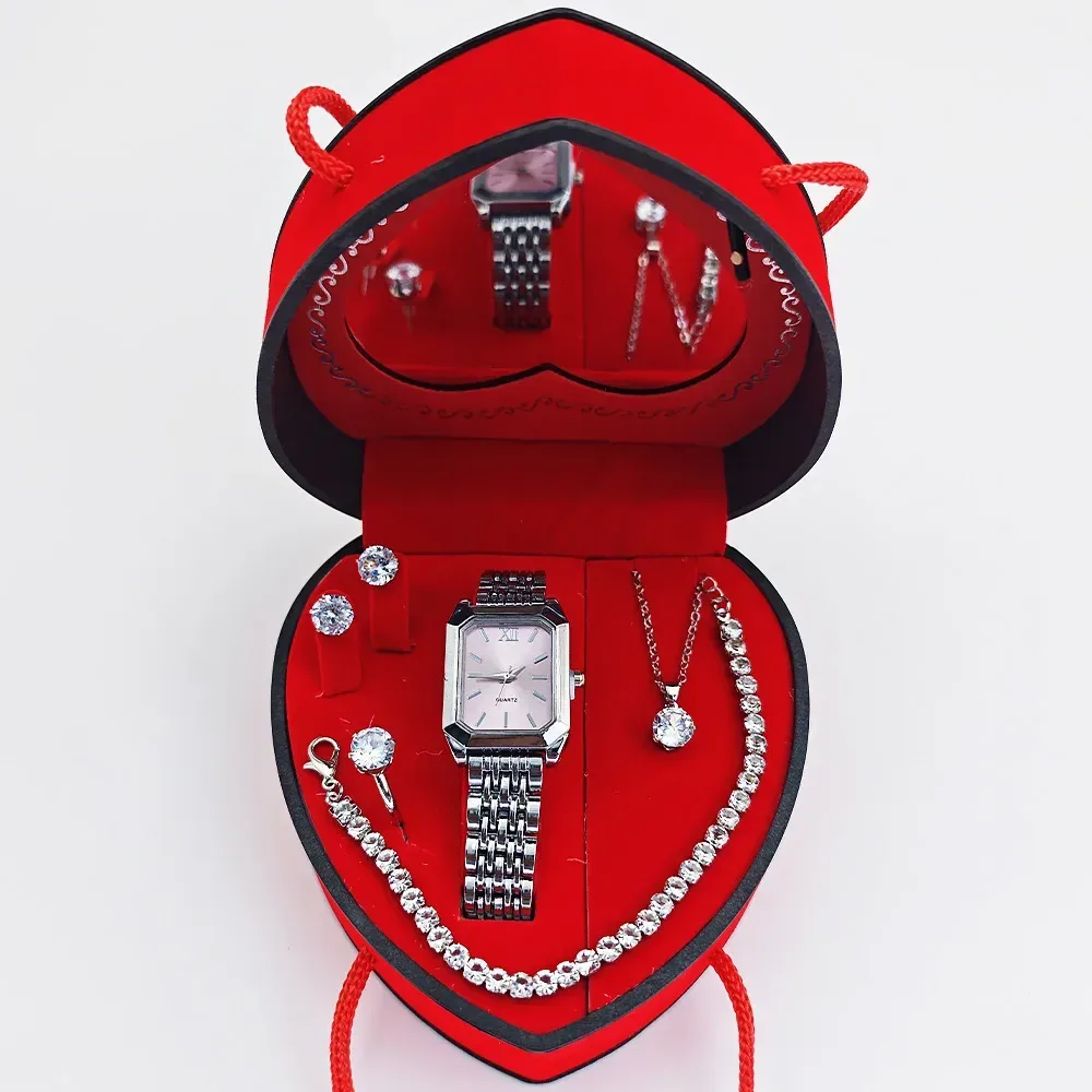 red heart shaped gift box with carry cord holding the watch set