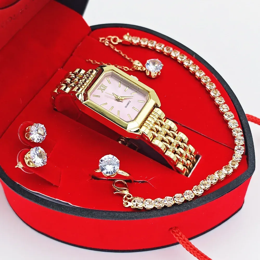 gold tone rectangular watch with pink dial, stud earrings and pendant necklace