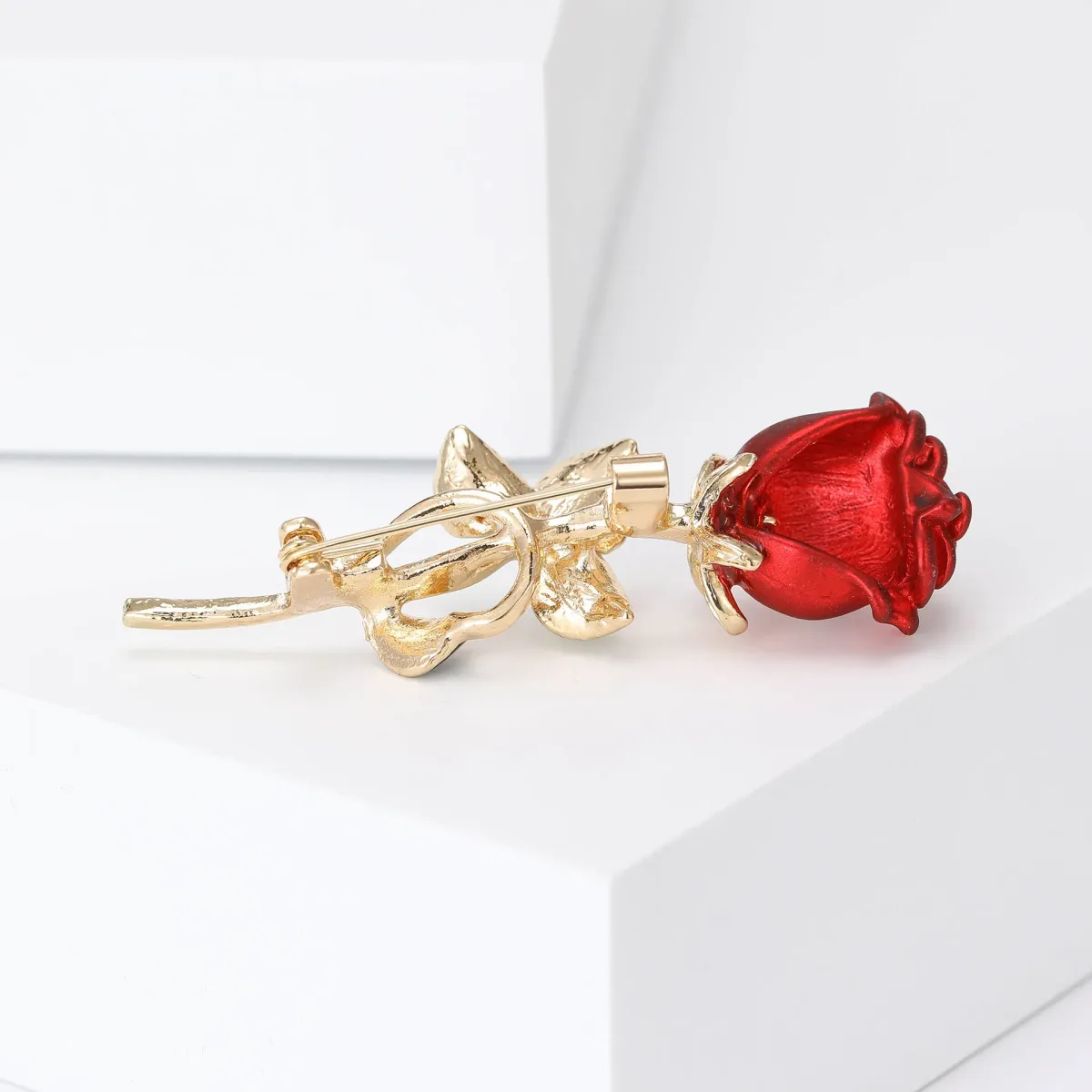 pin back along the stem of the rose brooch