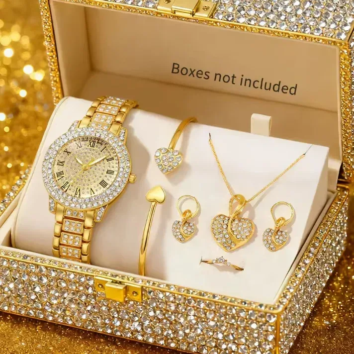 rhinestone watch jewelry set laid out: watch, necklace, earrings, bangle and ring