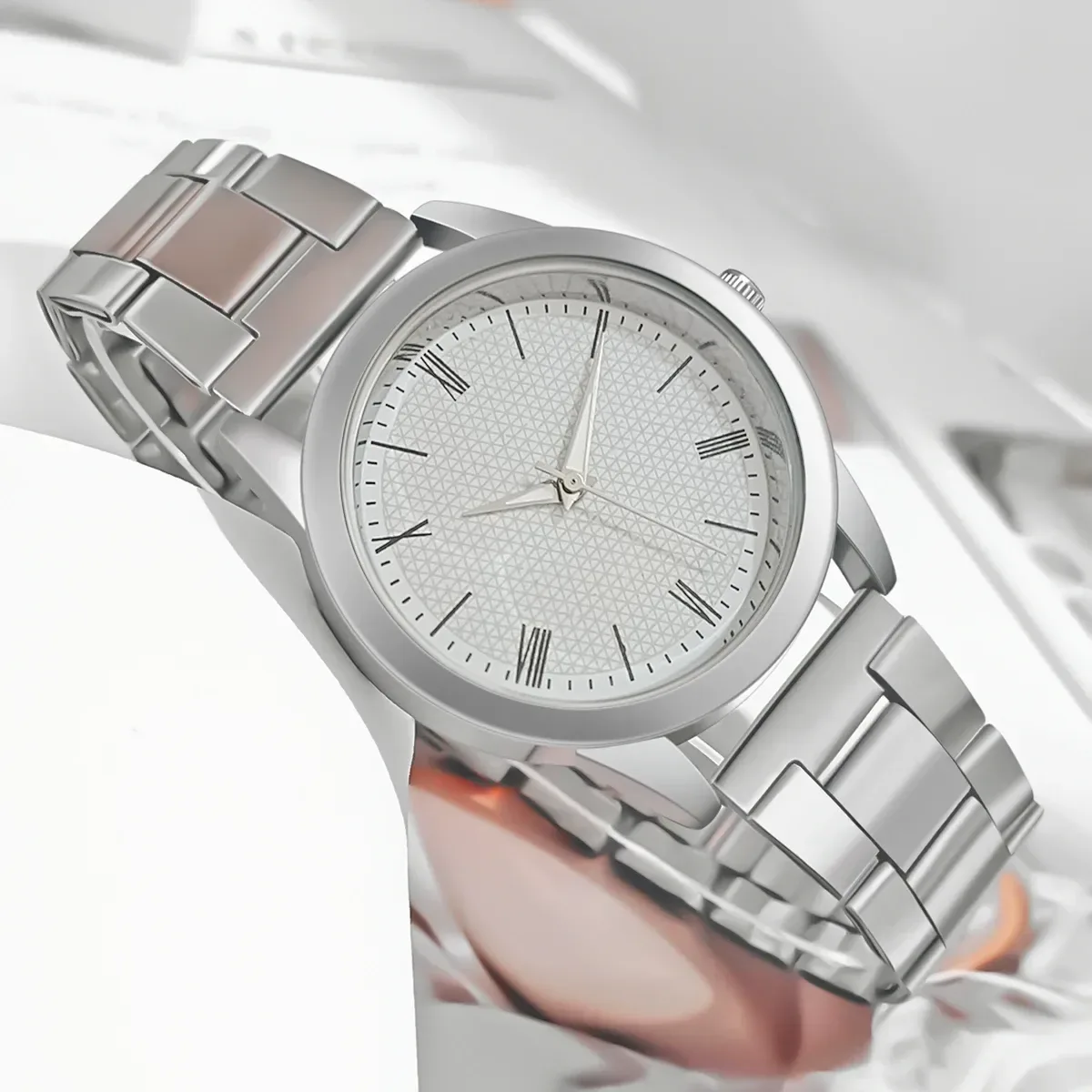 close view of the white dial with slim Roman numerals