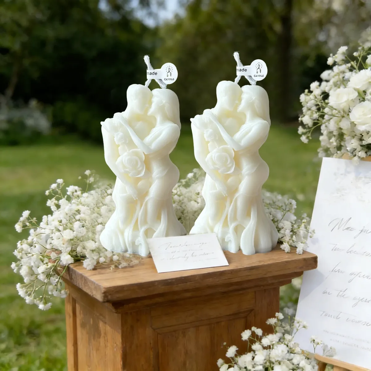 embracing couple candles as wedding table decor