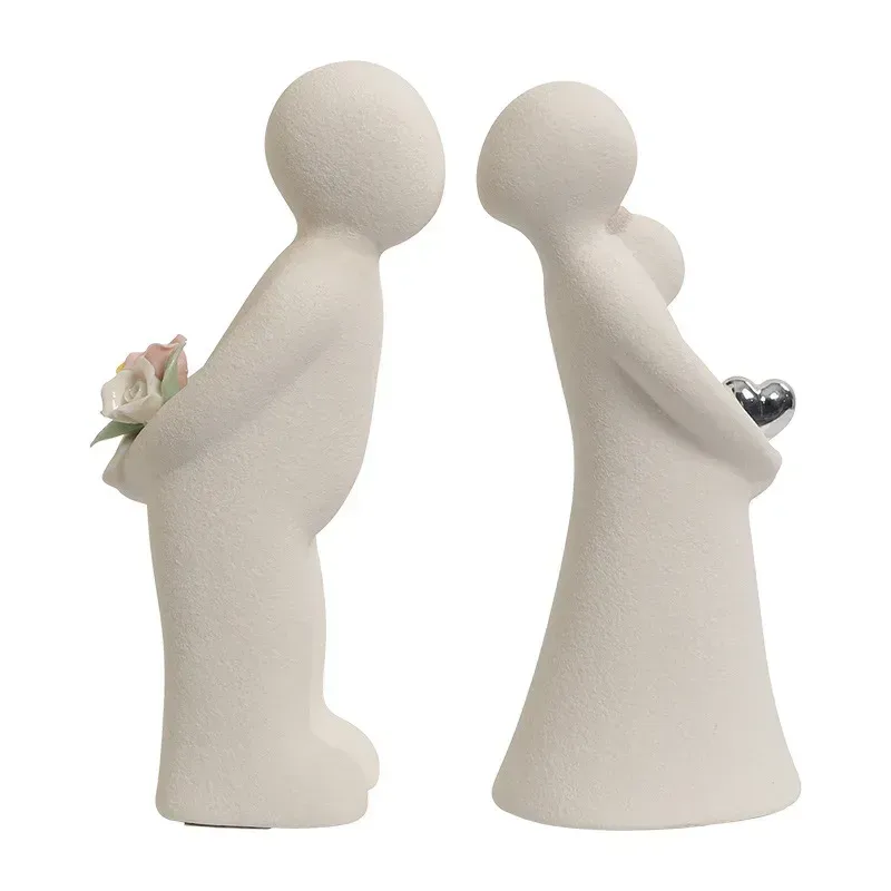 matte white finish of the kissing couple ceramic figurines