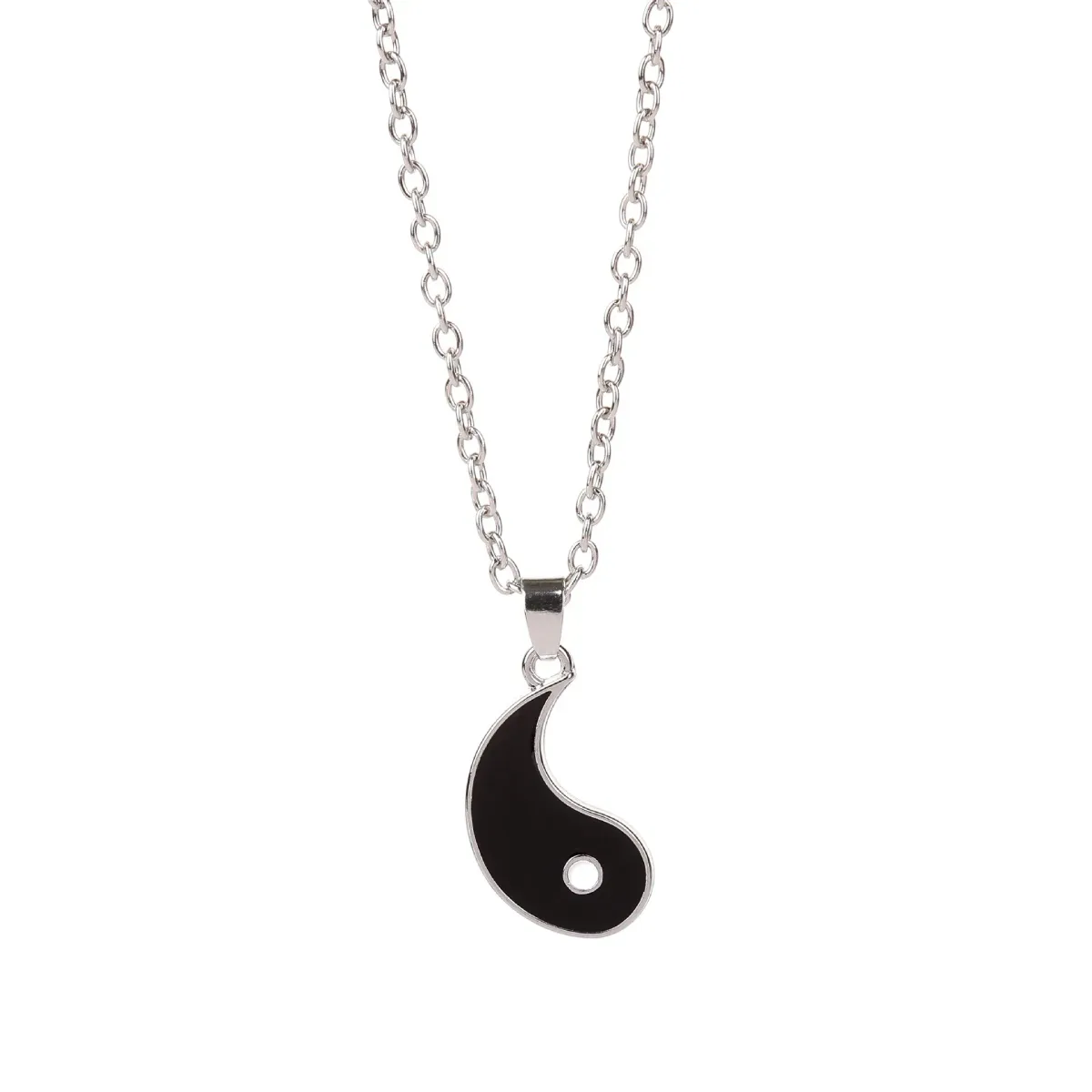 black half of the yin yang couple necklace on its chain