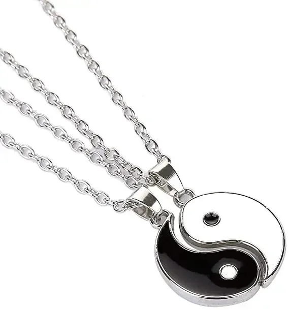 silver tone yin yang necklace halves fitted into one circle