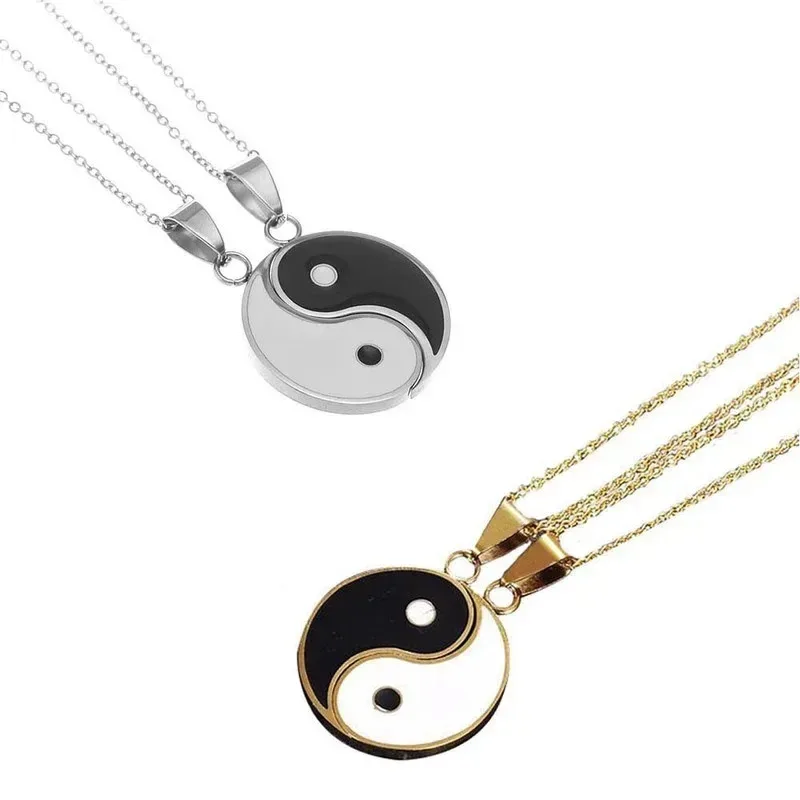 silver tone and gold tone yin yang necklaces compared
