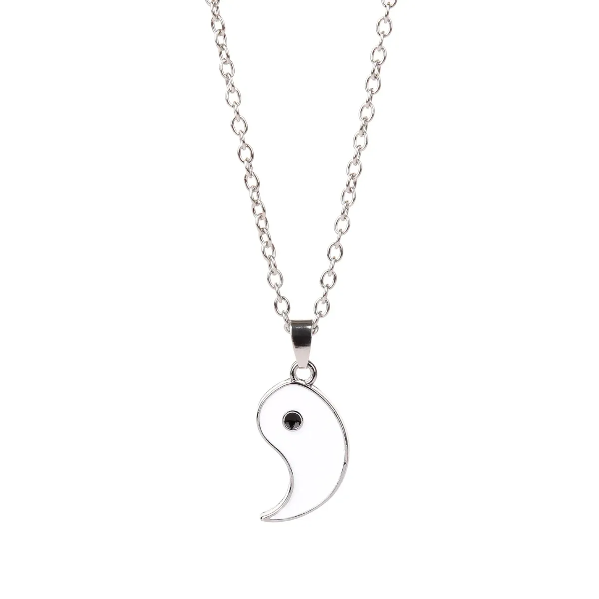 white half of the yin yang couple necklace on its chain