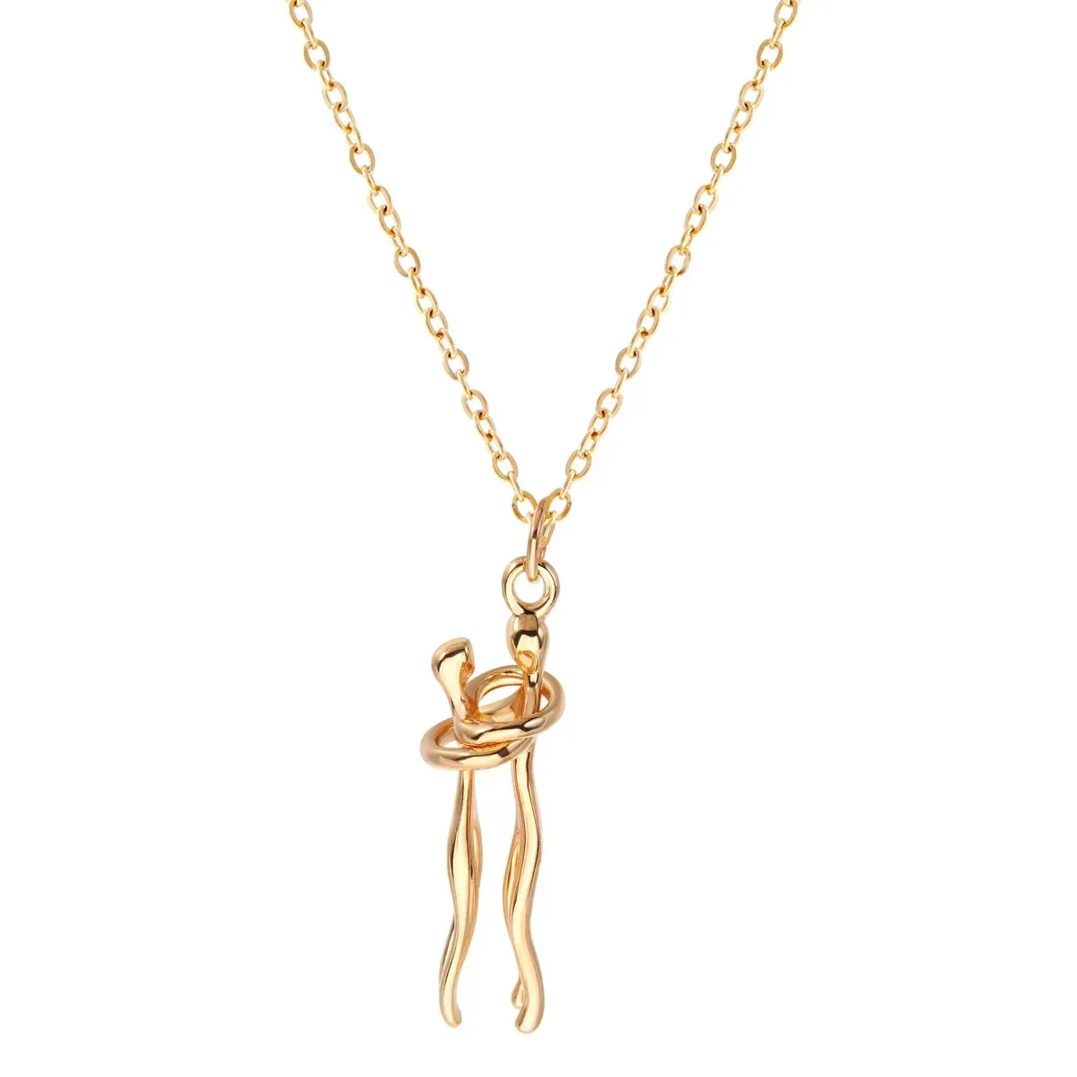 close view of the gold tone embracing couple pendant