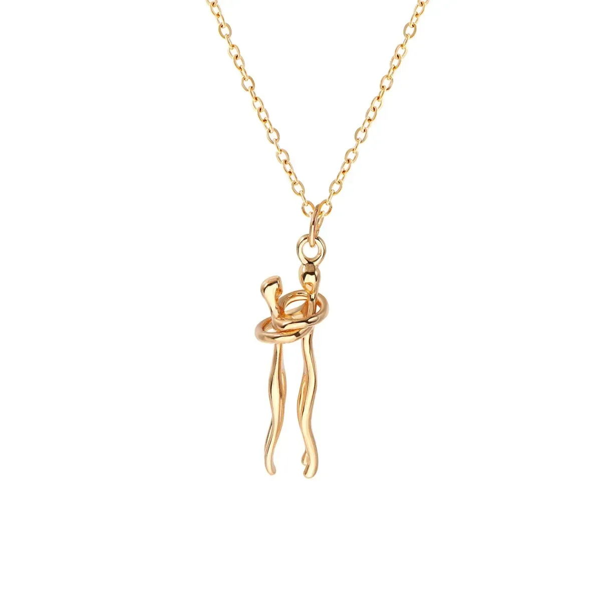 gold tone embracing couple pendant on its cable chain