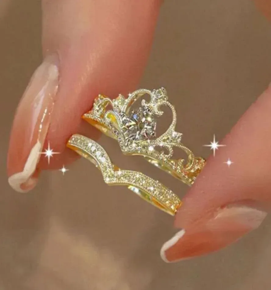 gold tone crown ring set stacked, close up of the filigree crown