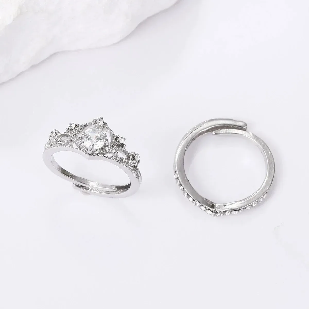 two pieces of the crown ring set: crown ring and rhinestone band
