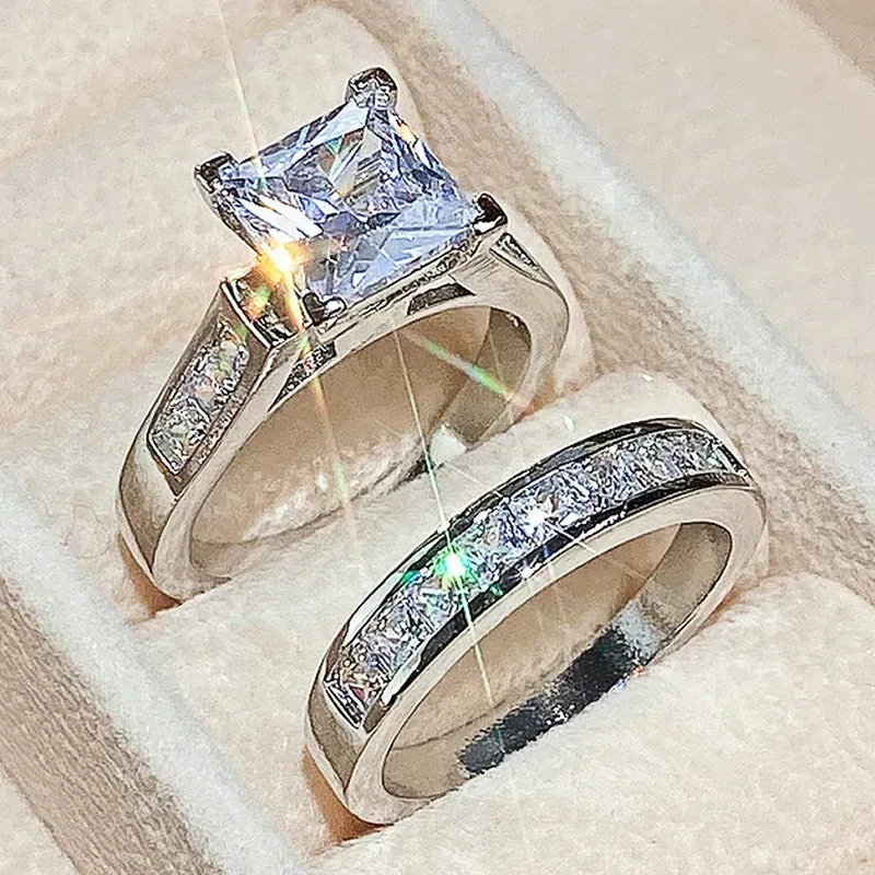 princess cut engagement ring and channel set band side by side