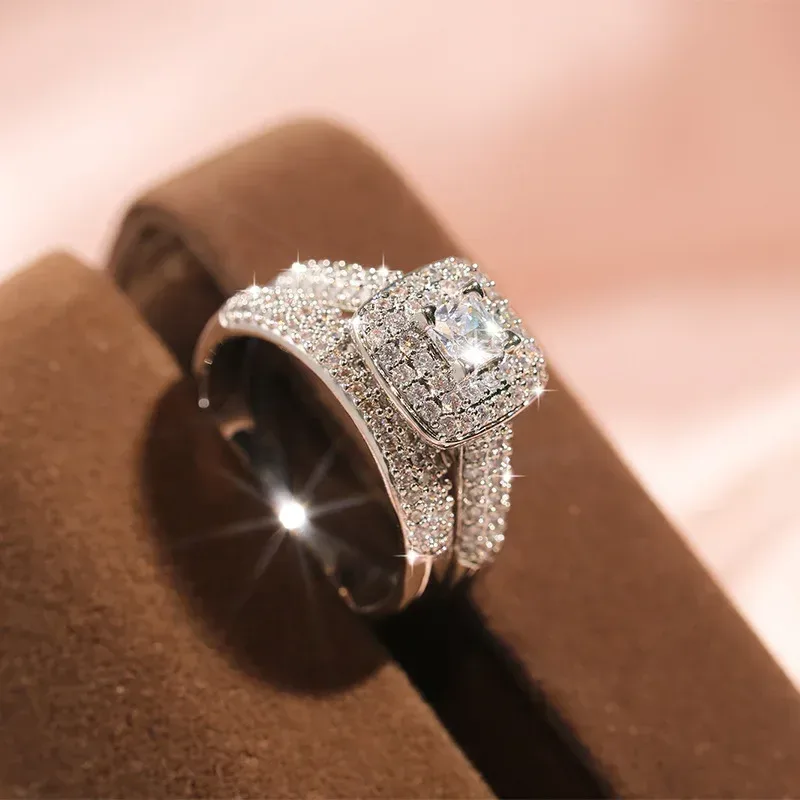 the two rings of the square halo bridal set