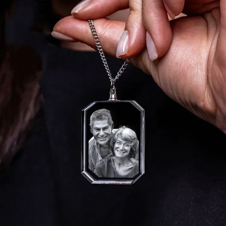 crystal photo pendant necklace held on its silver-tone chain