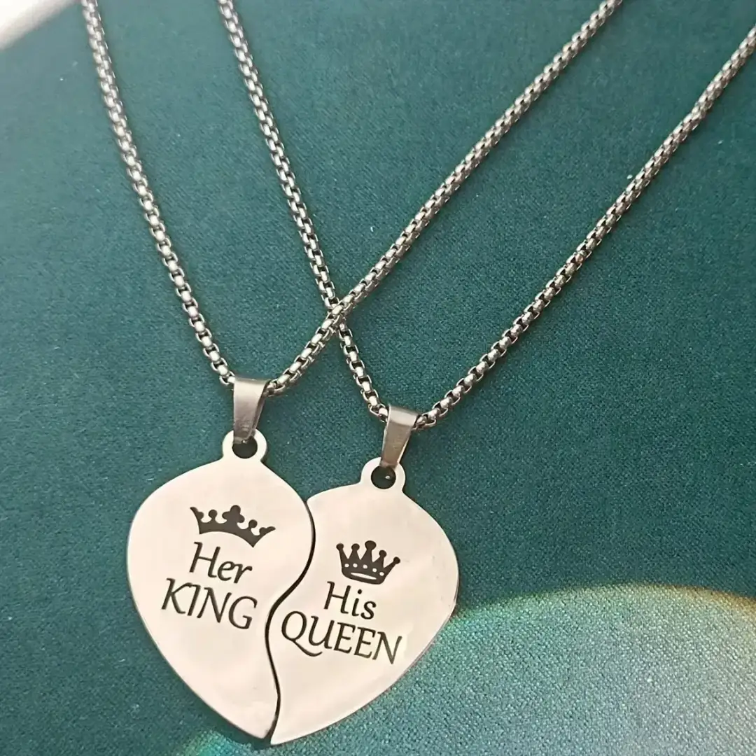 crown and script engraving on the split heart necklaces